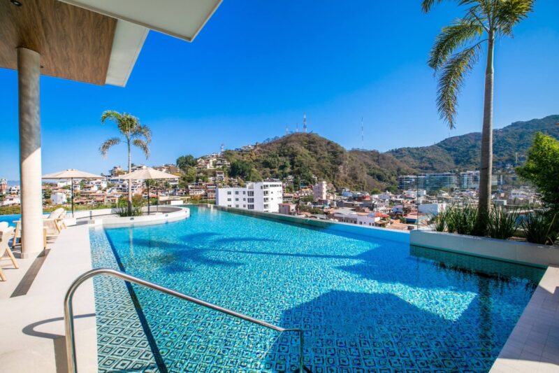 The Dvine rooftop infinity pool, with the Old Town and mountains beyond