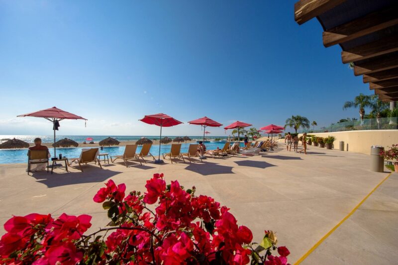 Red umbrellas and loungers on the Grand Venetian pool deck