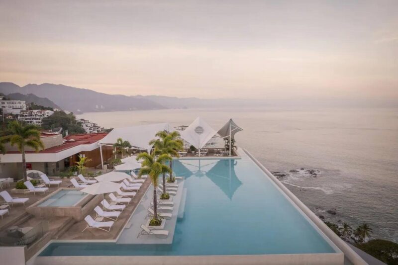 The Indah rooftop infinity pool above Amapas Beach and Banderas Bay
