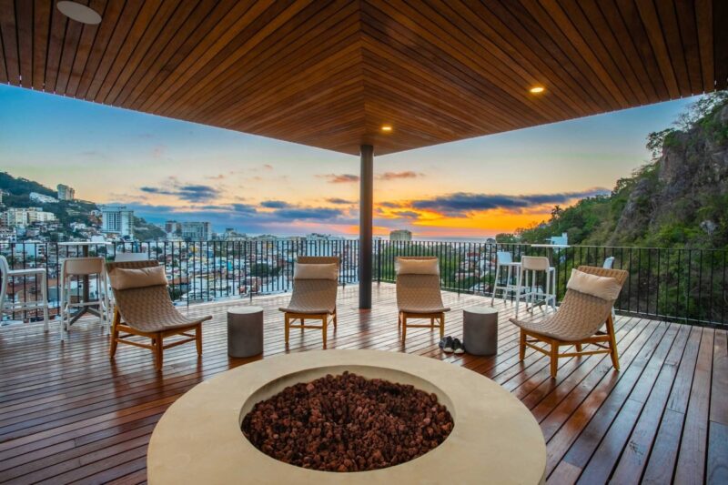 The covered rooftop lounge at Oasis at sunset