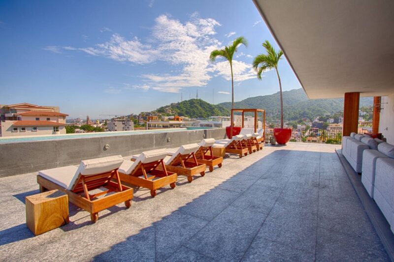 Loungers along the Oceana rooftop deck