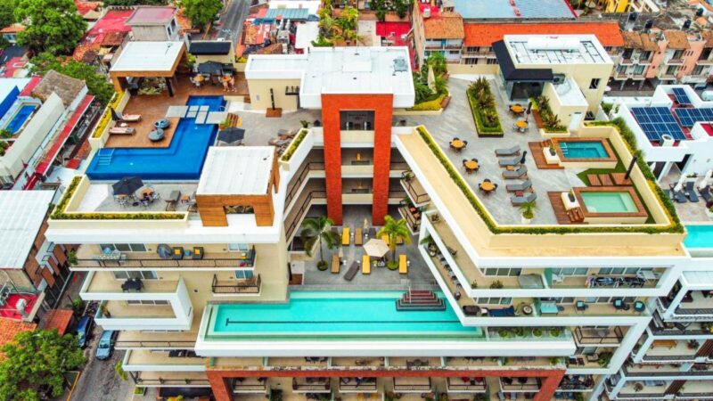 Aerial view of the Pavilion building, its lap pool and rooftop