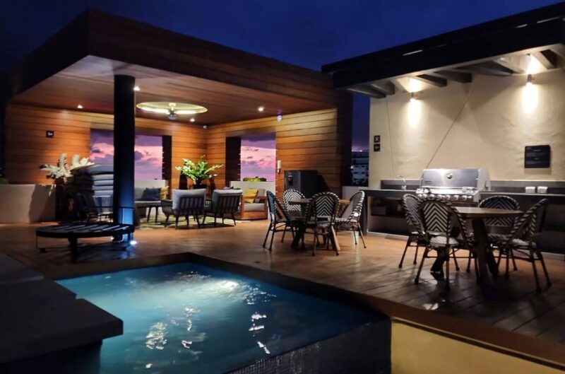The Pavilion rooftop pool and BBQ area at night