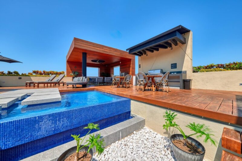 The Pavilion rooftop pool and wooden pergola