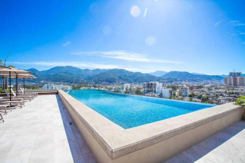 The Roma Encore infinity pool looking over Versalles to the mountains