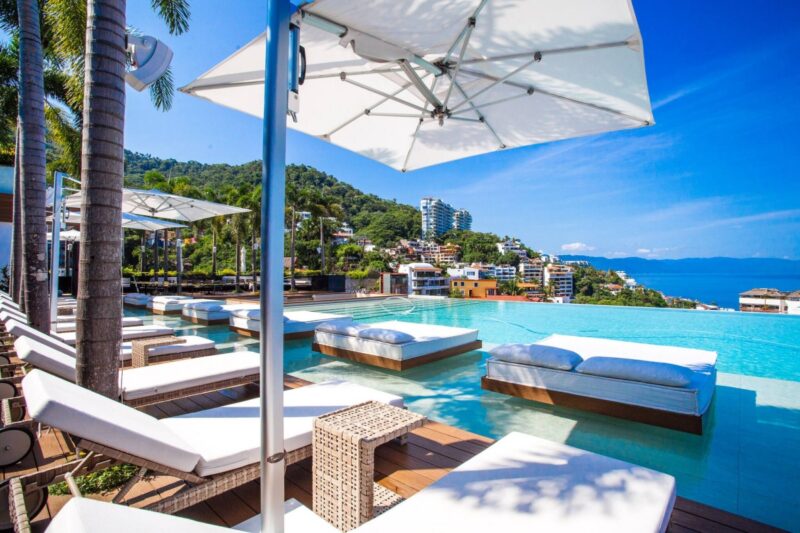 Cabanas and loungers by the Soho PV rooftop pool